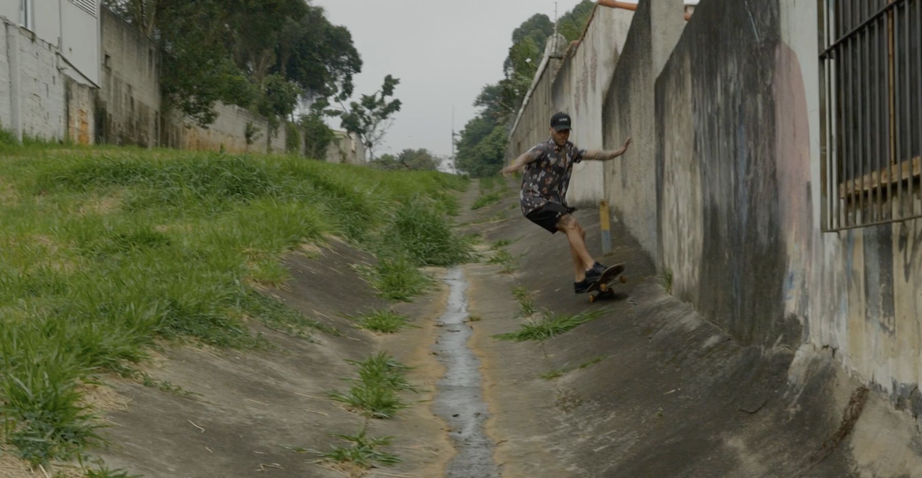 Marcelo carves the channel wall like a wave face