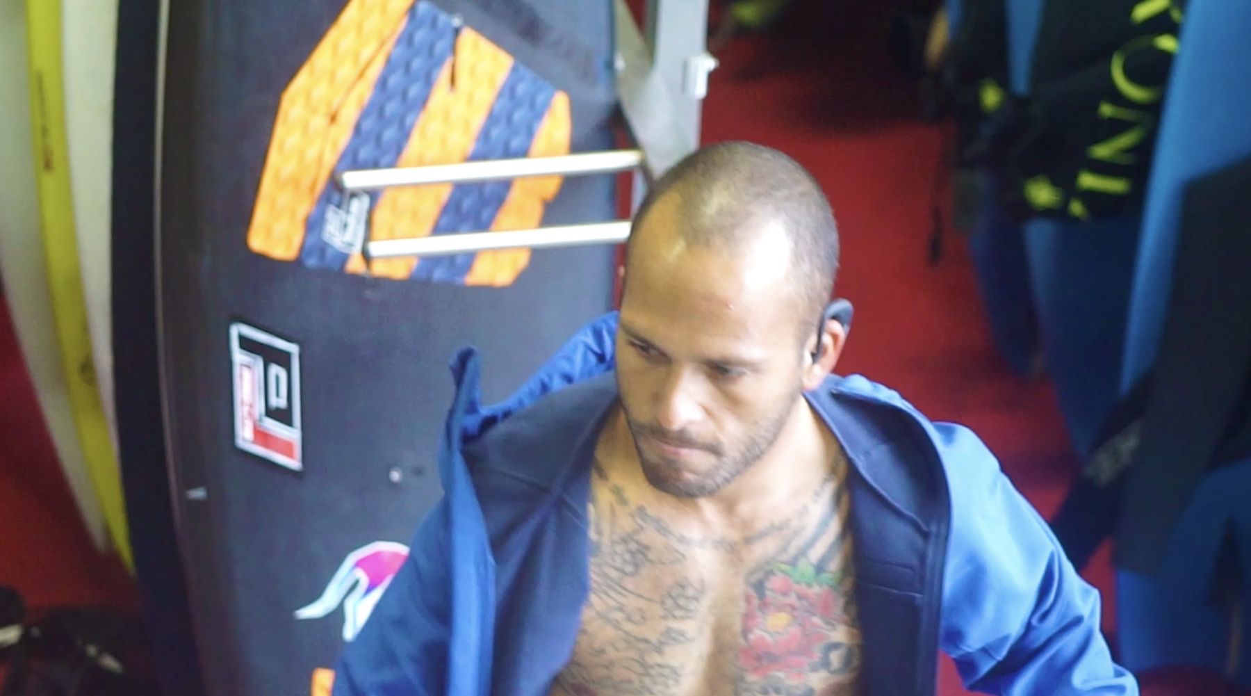 Marcelo gears up beside a tow board
