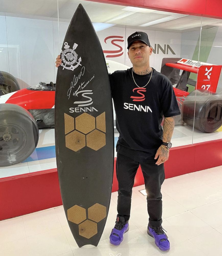 Marcelo with a signed Senna surfboard